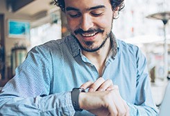 Man checking time on watch