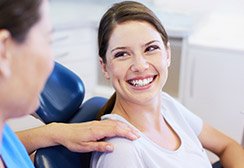 Smiling woman in dental chair