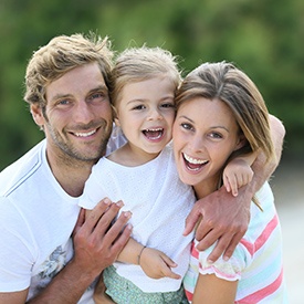 Happy family of three