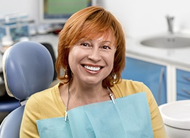 Smiling woman in dental chair