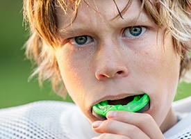 Preteen boy with sportsguard