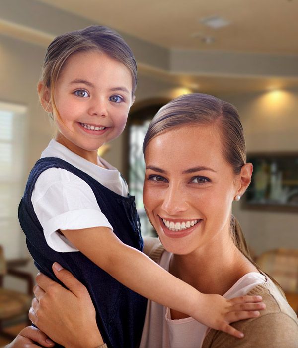 Smiling mother and daughter